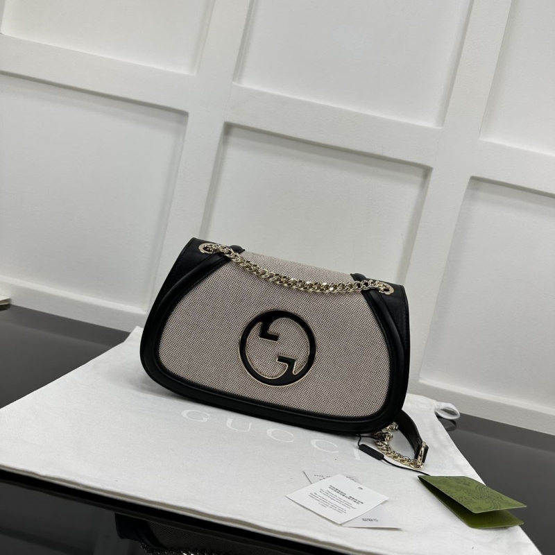 G*u*i satchel bags